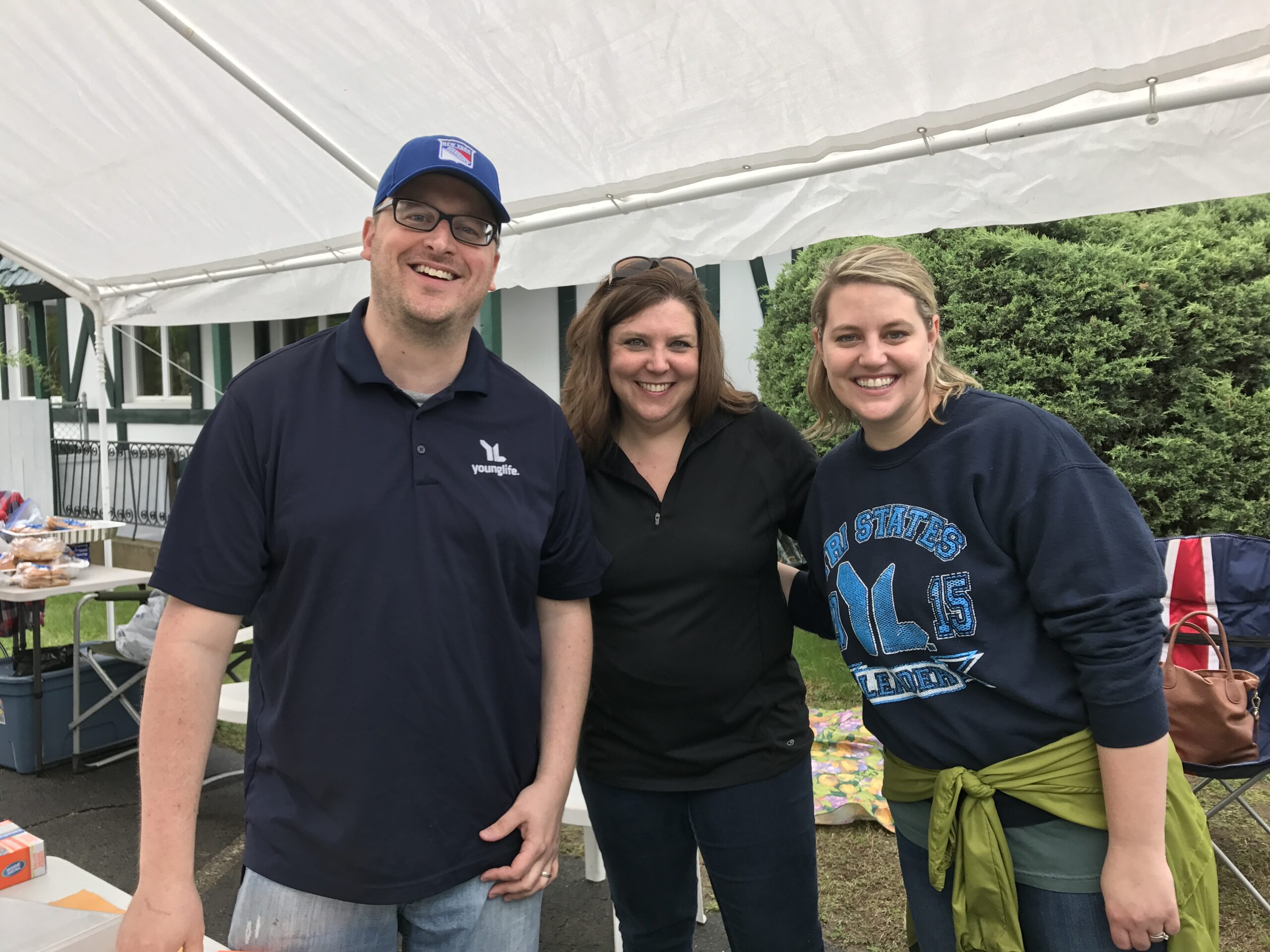 three people posing for photo at yetter insurance